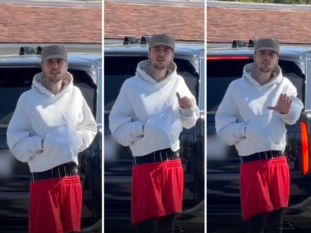 Justin Bieber stands up against paparazzi during his public appearance with Haley Bieber