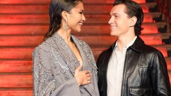 Tom Holland lists the benefits of working with Zendaya.